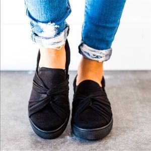 Black slip on canvas shoes